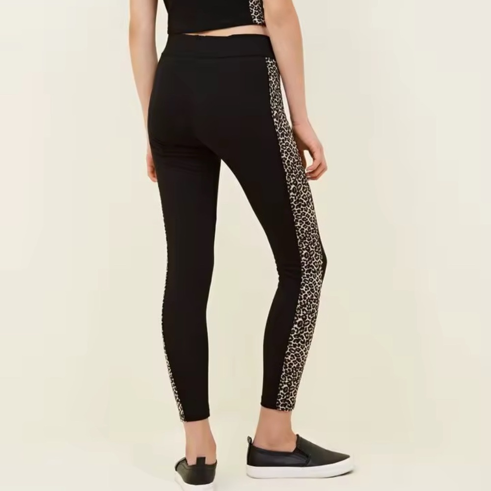 NWT Two pieces Guess Black Leggings and top with Animal Print